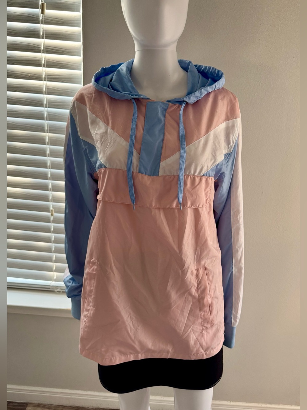 G-net pastel-toned anorak windbreaker featuring a color-block design and chevron